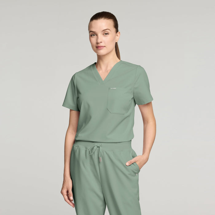 JAANUU Rhena Slim Essential 1 pocket Scrub Top Sage - Get Scrubbed