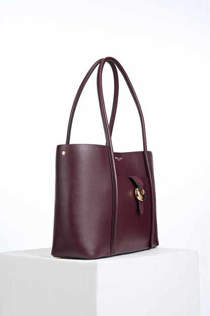 Side view of Lilibet Black Cherry Laptop Tote showing Cannon Street clasp detail on the front and two shoulder straps