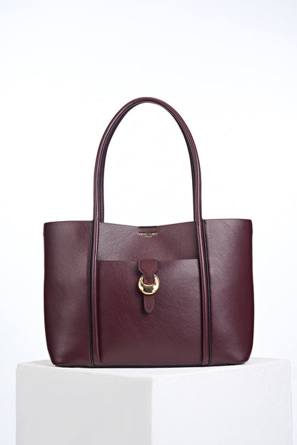 Front of Lilibet Black Cherry faux leather Laptop Tote showing molten metal Cannon Street Clasp closure on front slip-in pocket