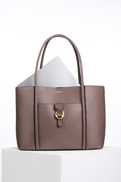 Front of Lilibet Fawn faux leather Laptop Tote with a laptop in the top showing molten metal Cannon Street Clasp closure on front slip-in pocket