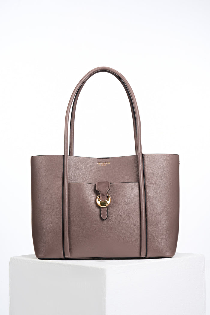 Front of Lilibet Fawn faux leather Laptop Tote showing molten metal Cannon Street Clasp closure on front slip-in pocket