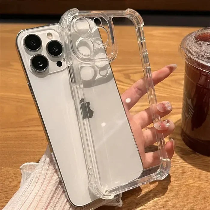 a woman holding a clear phone case