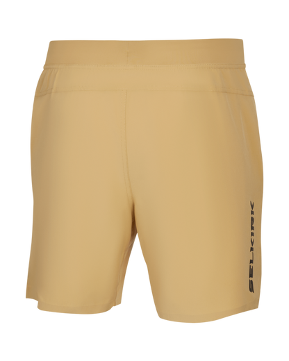Back view of mustard athletic shorts with vertical 'SELKIRK' logo on right leg.