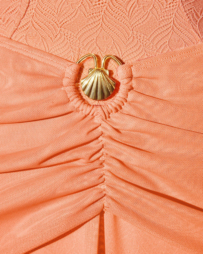 Detail shot of gold seashell hardware on Mermaid Sheer Maxi Skirty - Mesh Papaya/Gold Seashell