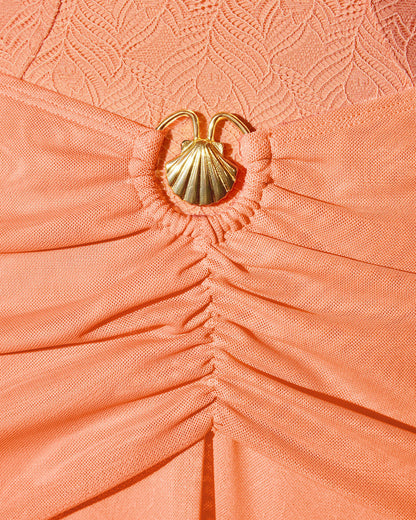 Detail shot of gold seashell hardware on Mermaid Sheer Maxi Skirty - Mesh Papaya/Gold Seashell