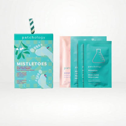 Foot treatment set with a teal box, a pink packet, and two teal pouches on a clean white background.