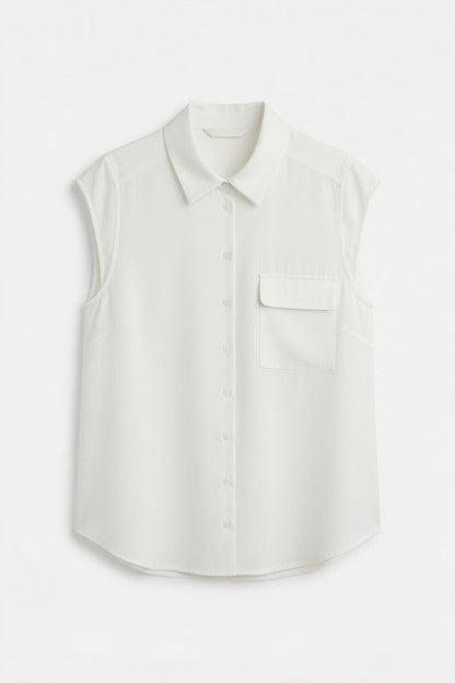 A sleeveless white button-up shirt with a pointed collar and a chest pocket, displayed on a clean white background.