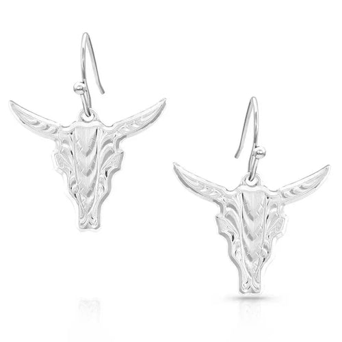 Silver bull head earrings on a white background
