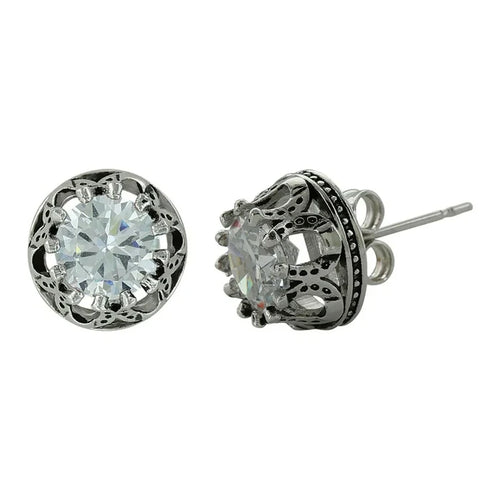 Pair of silver earrings with clear gemstones on a white background