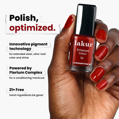 Close-up of a hand with decadent burgundy nail polish, showcasing a bottle of "Mull It Over" by LONDONTOWN. The text highlights innovative pigment technology, Florium Complex, and being free from 21+ harsh ingredients.