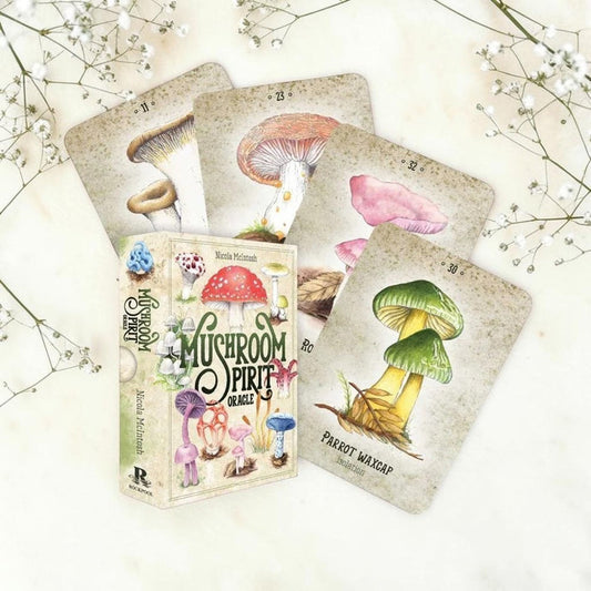 Mushroom spirit oracle deck on white background with flowers