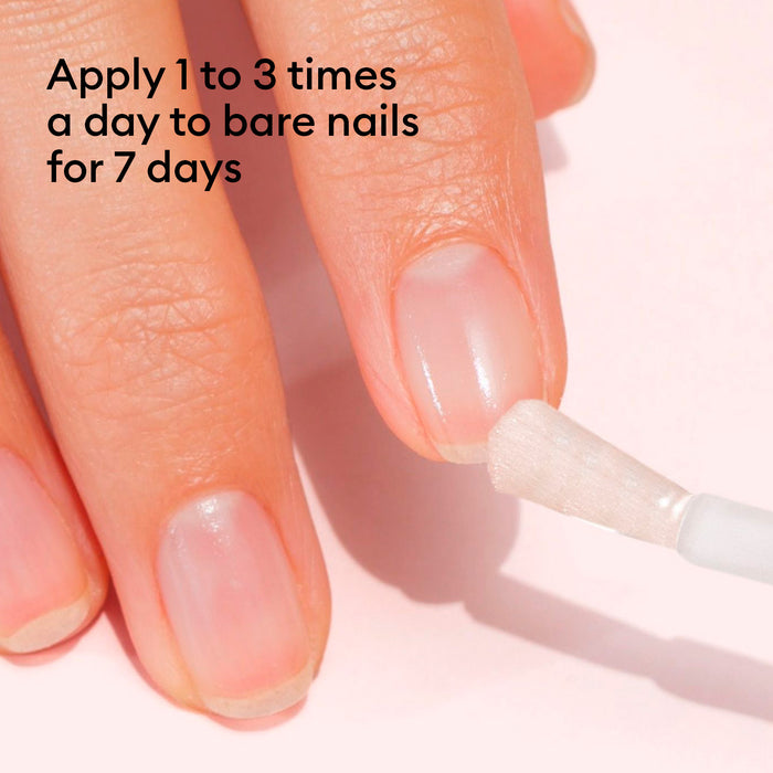 A bare-nailed hand is shown as Manucurist Nail Strengthening Serum is applied. Text: Apply 1 to 3 times daily to bare nails for 7 days for strong, healthy nails.