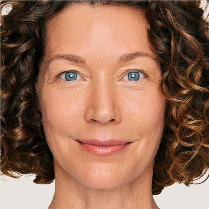 An image of a woman wearing FlexShade Foundation by No Makeup Makeup in Medium