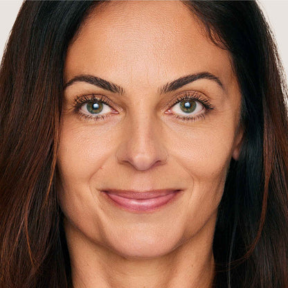 An image of a woman wearing FlexShade Foundation by No Makeup Makeup in Medium
