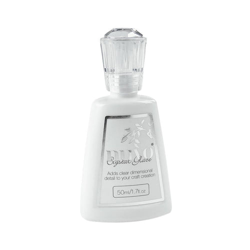 Nuvo-Crystal Glaze. Add clear dimensional detail to your craft creation! This package contains 1.7oz of crystal glaze. Imported. Available at Embellish Away located in Bowmanville Ontario Canada.