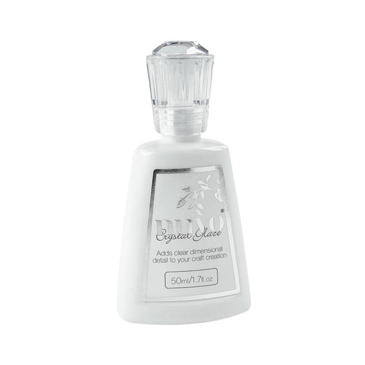 Nuvo-Crystal Glaze. Add clear dimensional detail to your craft creation! This package contains 1.7oz of crystal glaze. Imported. Available at Embellish Away located in Bowmanville Ontario Canada.