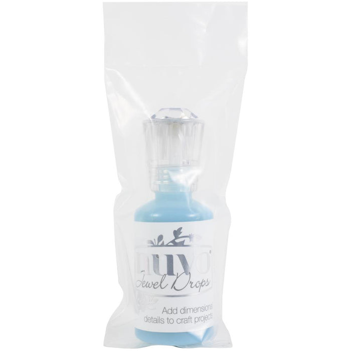 Nuvo-Jewel Drops. Add dimensional translucent tints to your paper craft projects! This package contains 30ml/1oz of jewel drops. Comes in a variety of colors. Each sold separately. Available at Embellish Away located in Bowmanville Ontario Canada. Iceberg Blue
