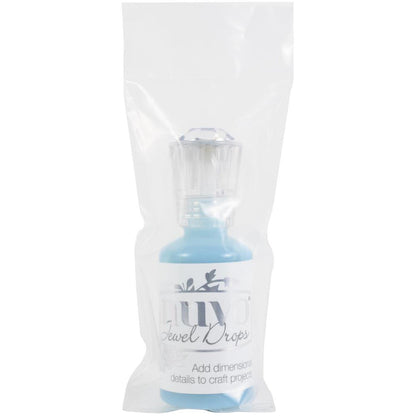Nuvo-Jewel Drops. Add dimensional translucent tints to your paper craft projects! This package contains 30ml/1oz of jewel drops. Comes in a variety of colors. Each sold separately. Available at Embellish Away located in Bowmanville Ontario Canada. Iceberg Blue