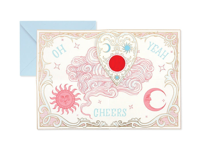 Pop-up card front in pink with “YEAH” and “CHEERS” text accents, paired with blue envelope