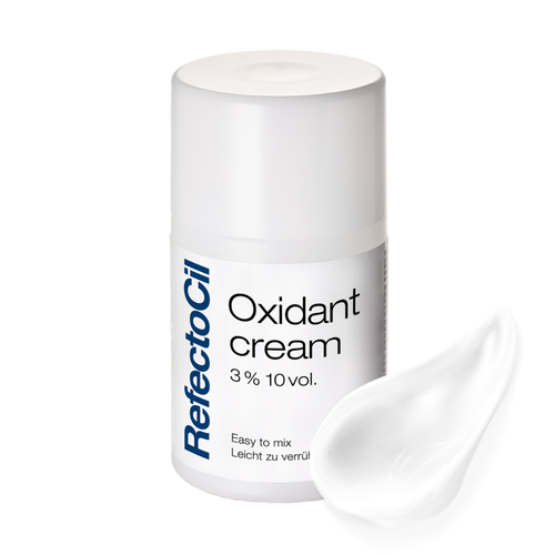 F003F Refectocil Eyelash and Brow Oxidant Cream | A white cylindrical bottle of Refectocil Oxidant cream with a white lid, shown on a white background with a white cream smear in front of the bottle.