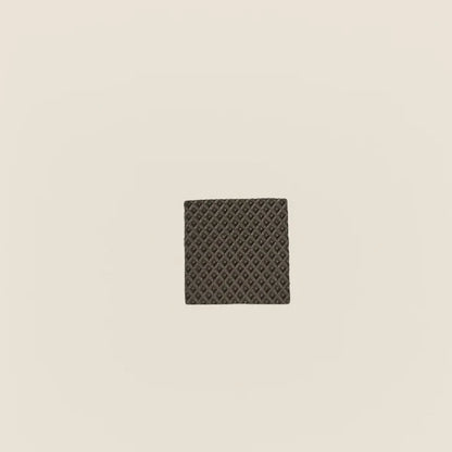 Single textured rubber grip pad for Gratz Pilates equipment feet.
