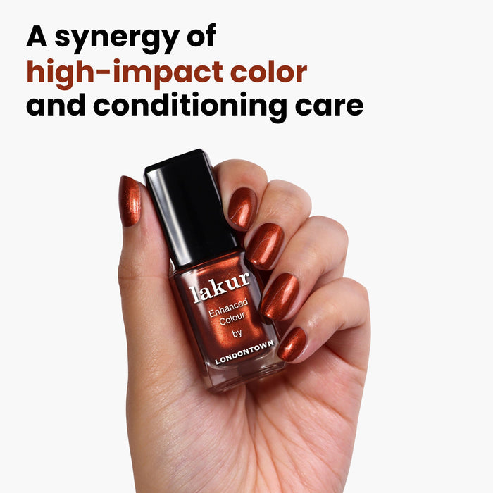A hand holds a bottle of LONDONTOWN's Posh Forever nail polish in a shimmering cinnamon shade, with matching nails. Text above reads: "An alliance of vibrant color and nurturing care.