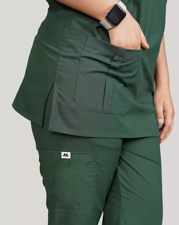 Close-up of a hunter green Medfit unisex scrub top and pants, highlighting functional pockets and the Medfit logo for medical professionals.