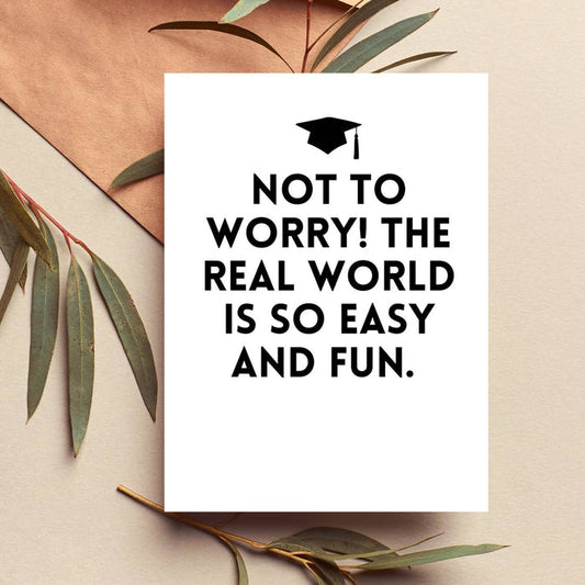 White graduation card, cap icon, text: NOT TO WORRY! THE REAL WORLD IS SO EASY AND FUN.