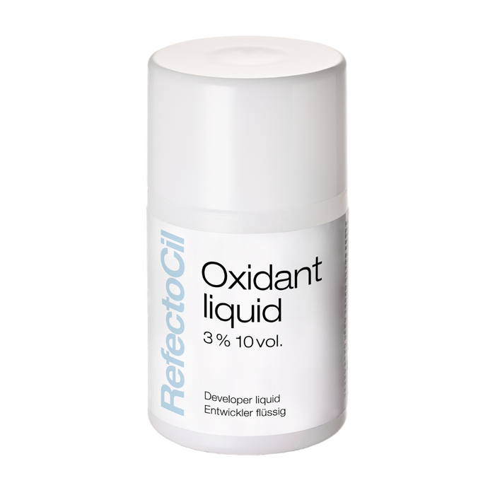 f003c REFECTOCIL Oxidant Liquid for Lash and Brow Tinting | A white cylindrical bottle of RefectoCil Oxidant liquid 3% 10 vol. developer liquid, shown on a clean white background