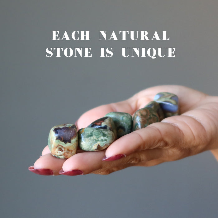 rhyolite tumbled stones in hand