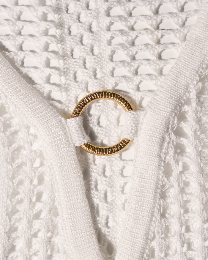 Detail shot of gold hardware on Ringy Mini Cover Up - Crochet White