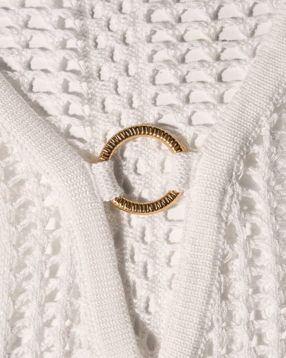 Detail shot of gold hardware on Ringy Mini Cover Up - Crochet White