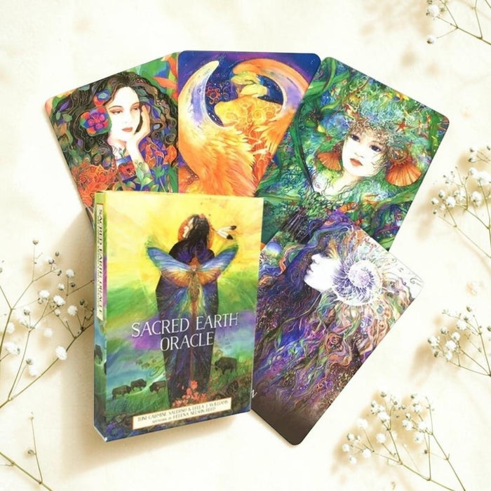 Colorful Oracle cards with 'Sacred Earth Oracle' box on a light background