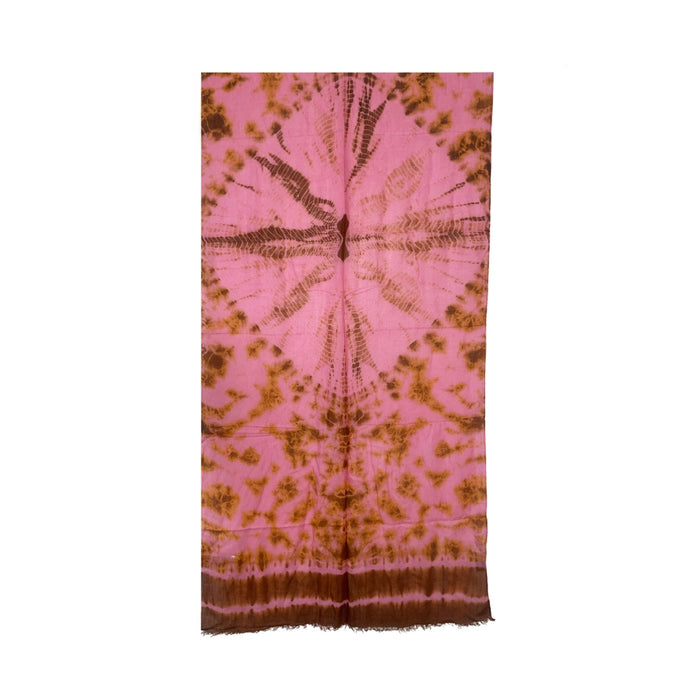 Tie-dye scarf with pink and brown pattern on a white background