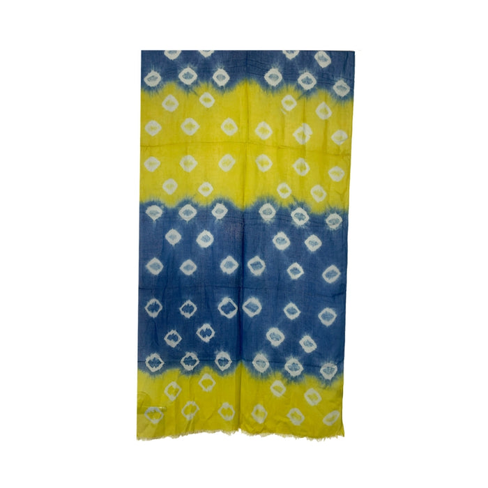 Tie-dye scarf with blue and yellow pattern on a white background