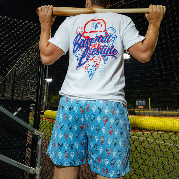 Adult model wearing red, white & blue Scoops Ice Cream Light Blue shorts