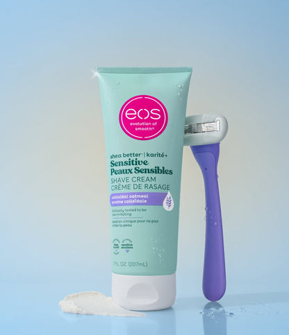 Eos Sensitive Peaux Sensibles shave cream with a purple razor on a gradient blue background