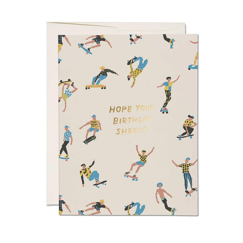 Birthday card with skater pattern and 'HOPE YOU BIRTHDAYS SHREDS' on cream, with envelope.