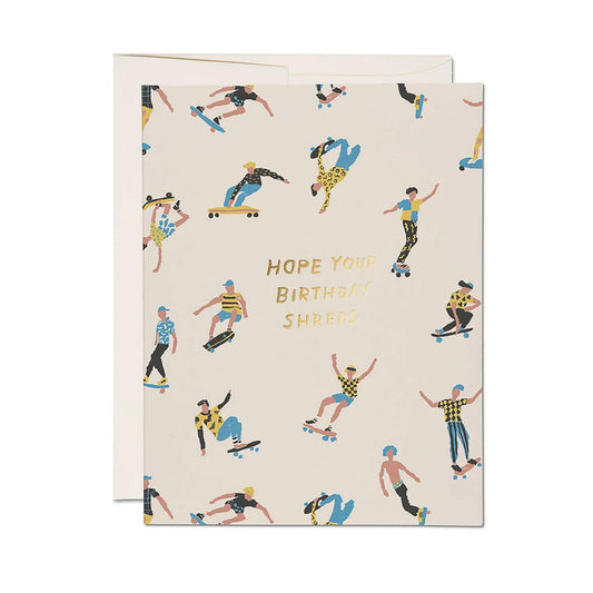 Birthday card with skater pattern and 'HOPE YOU BIRTHDAYS SHREDS' on cream, with envelope.