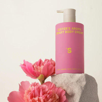 Sister's Aroma Body Cream Peony surrounded by pink peonies on a light background
