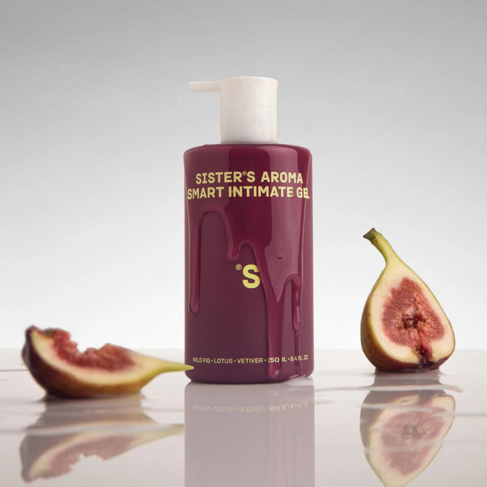 Bottle of 'Sister's Aroma Smart Intimate Gel' with figs on a reflective surface