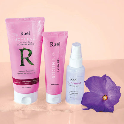 Rael Soothing Vulva Care Set packaging, including Soothing Vulva Gel, Soothing Gel to Foam Feminine Wash and Soothing Feminine Mist on a peach background with a purple flower.