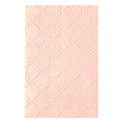 Spellbinders - 3D Embossing Folder - Ribbons & Seams. Approx. Size: 5.50 x 8.50 in./13.97 x 21.60 cm. Available at Embellish Away in Bowmanville Ontario Canada.