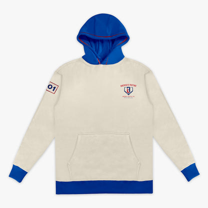 Cream stadium hoodie with royal blue hood, BL101 logo and cuffs