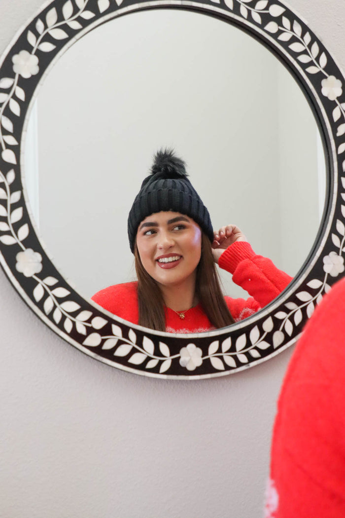 girl wearing black knit beanie