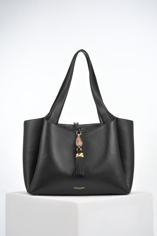Stella Black faux leather Laptop Tote with Signature Mayfair Tassel closure detail