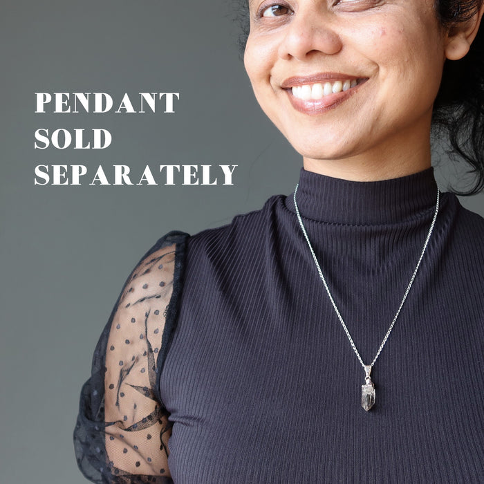 sheila of satin crystals wearing sterling silver curb with pendant