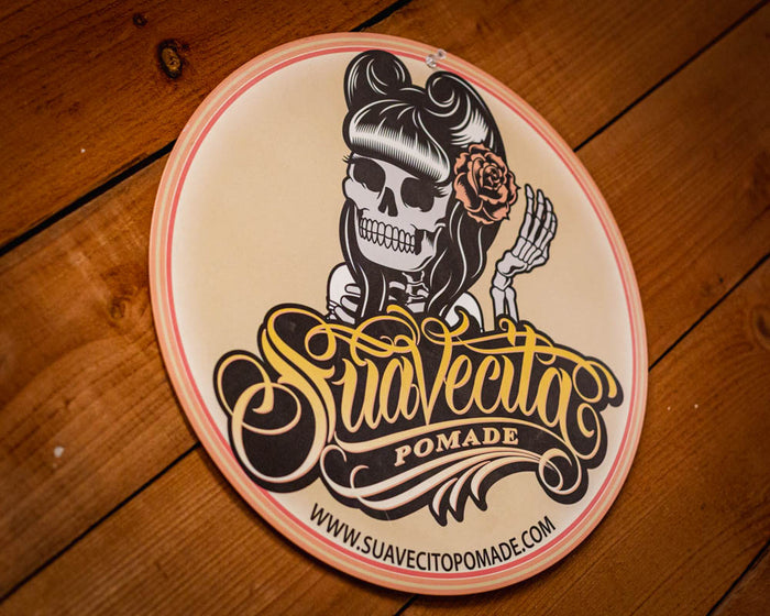 Suavecita Top Logo Embossed Metal Sign