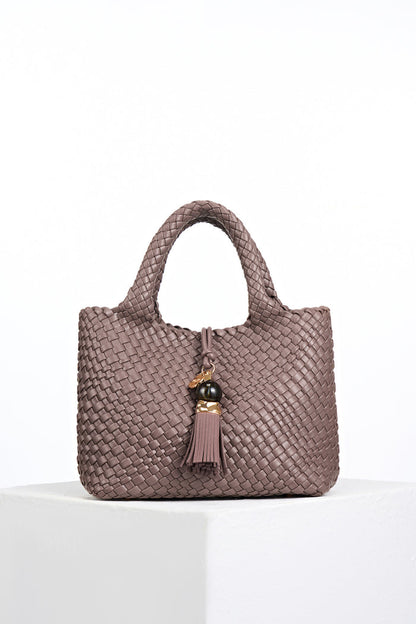 Suky Fawn faux leather Woven Crossbody with Signature Thames Tassel closure detail