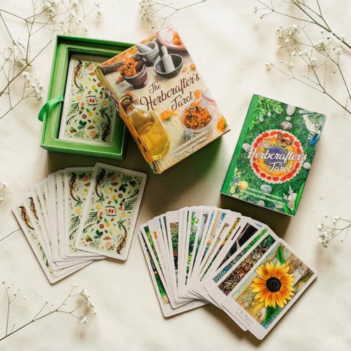 Herb-themed card game with cards and packaging on a light surface.